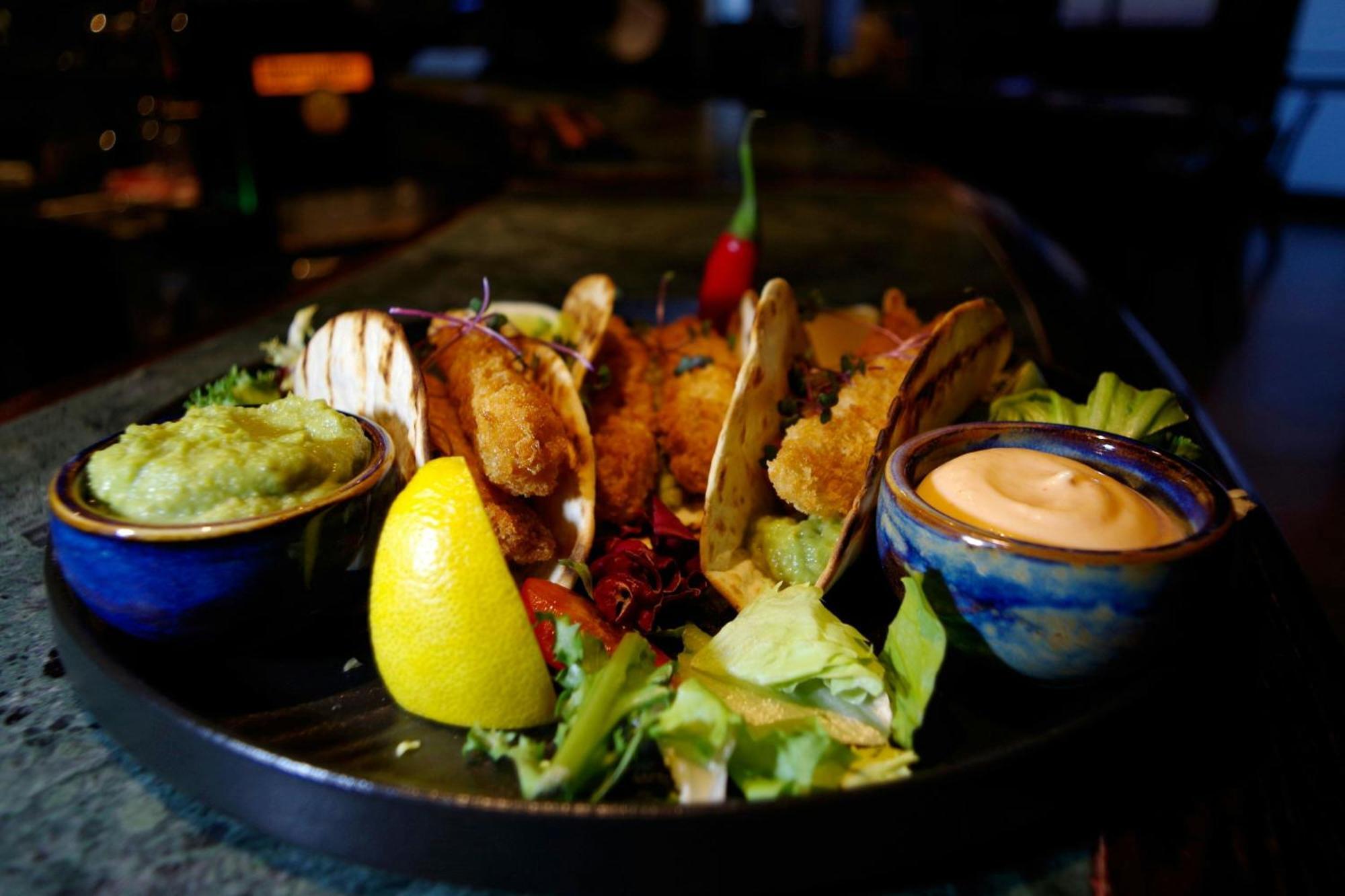 Sheraton Poznan Hotel Εξωτερικό φωτογραφία A plate of tacos