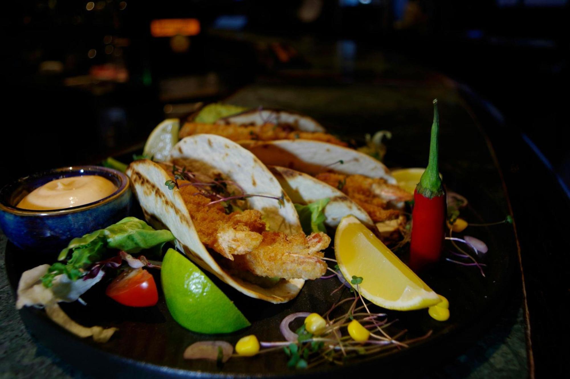 Sheraton Poznan Hotel Εξωτερικό φωτογραφία A plate of grilled mussels